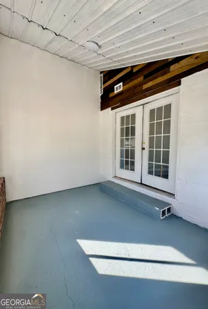 a house with trees in the background