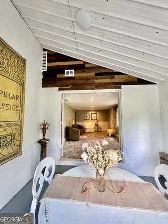 a kitchen with a sink cabinets and window