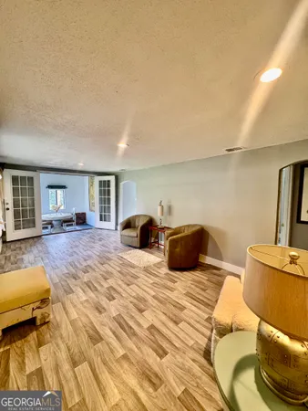 a view of a hallway with washer and dryer