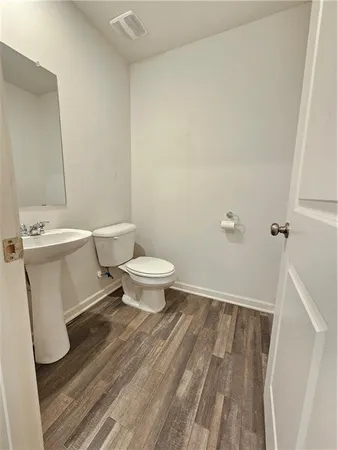 a bathroom with a sink and a toilet