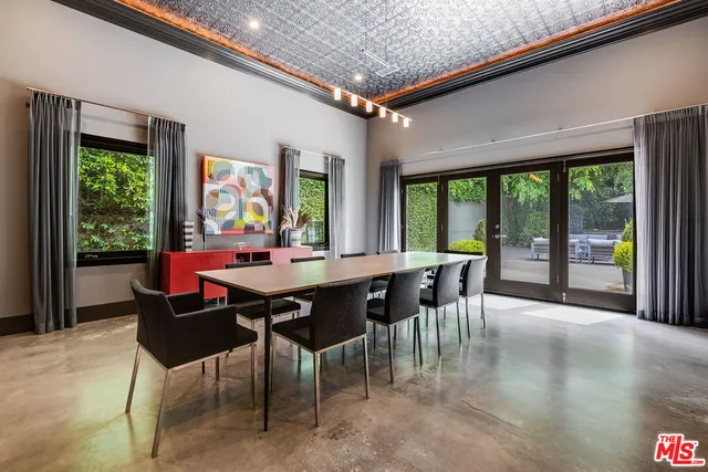 a workspace with furniture and a window