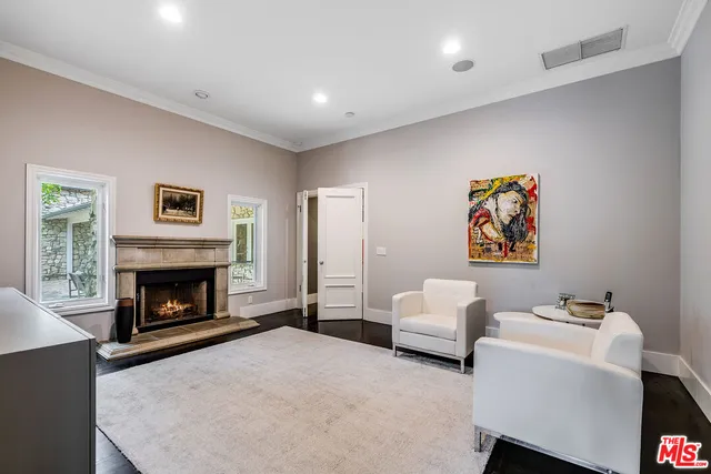 a large spacious bathroom with a double vanity sink large mirror and a bathtub