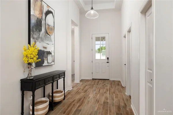 a view of entryway with wooden floor