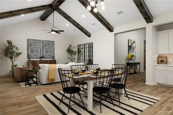 a view of a dining room with furniture