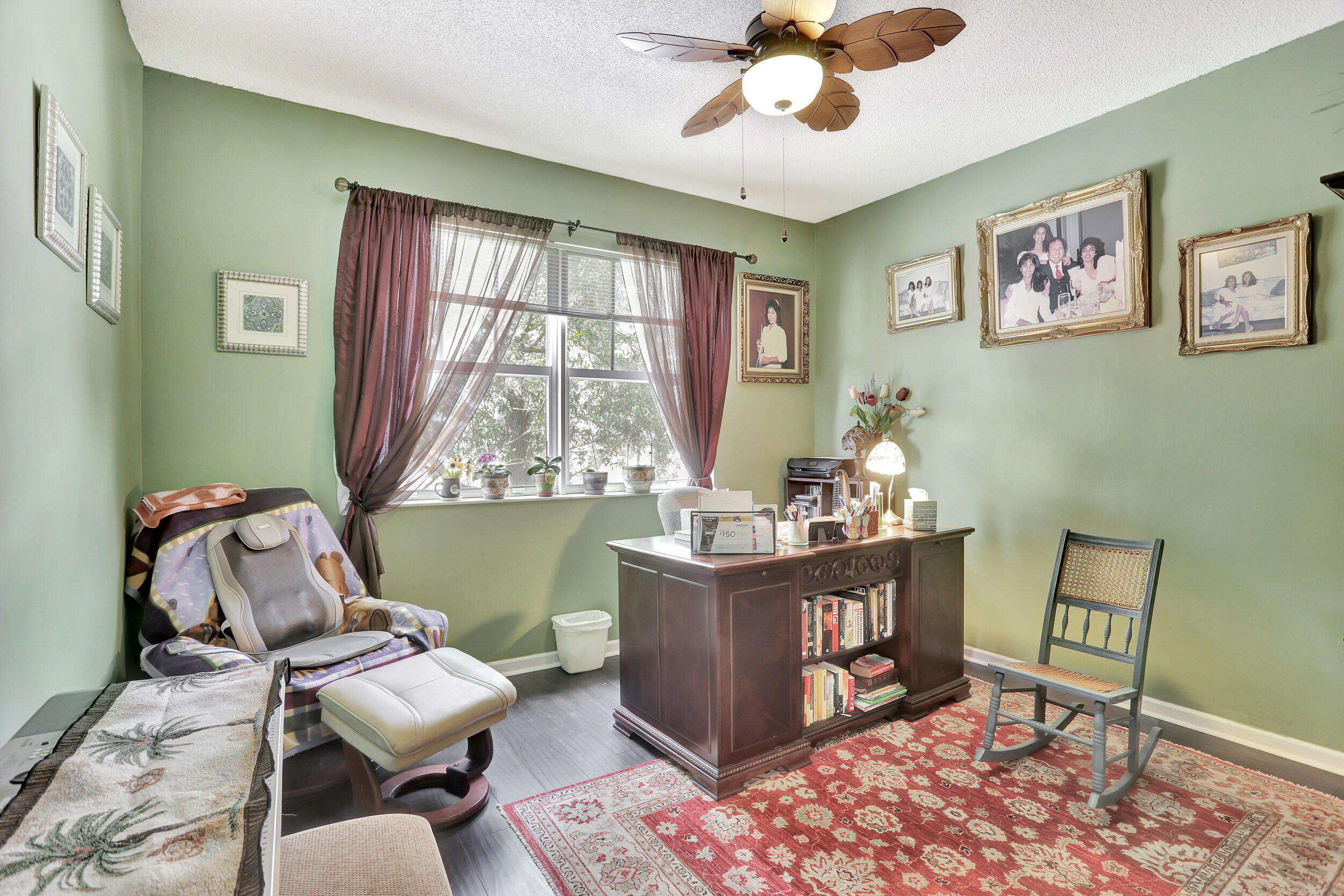 5800 West Sample Road, Unit 206 Coral Springs, FL 33067 - Photo 18 of 24 a living room with furniture and a window