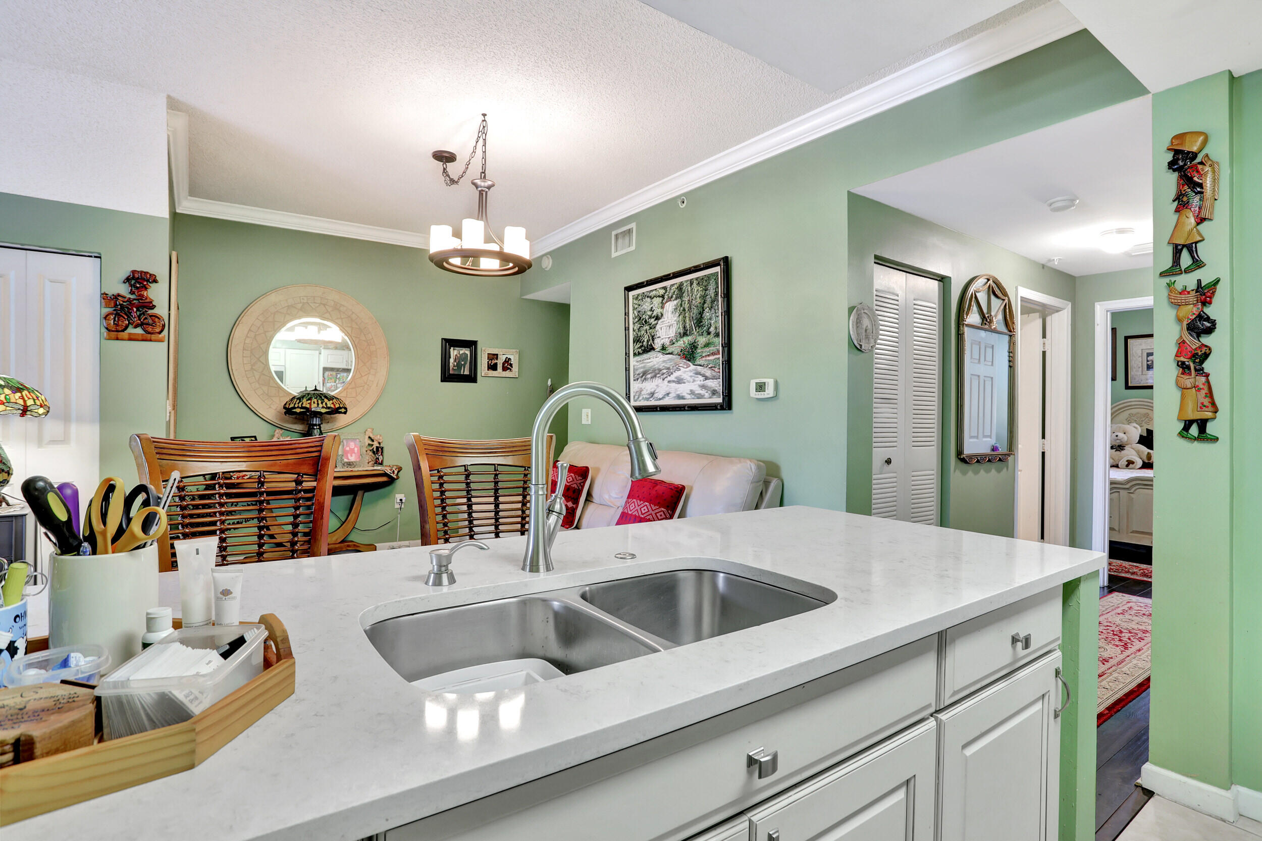 5800 West Sample Road, Unit 206 Coral Springs, FL 33067 - Photo 8 of 24 a bathroom with a sink and a mirror