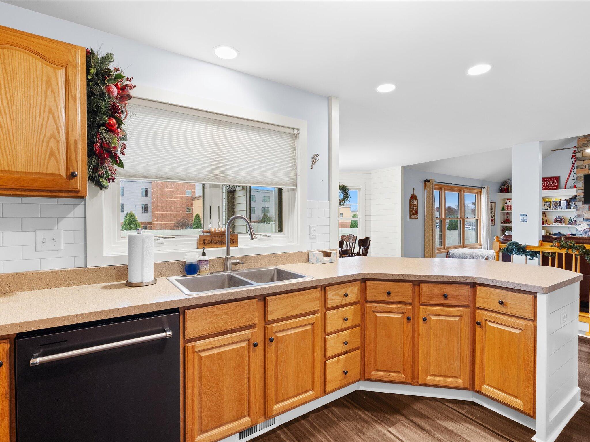 8407 Heron Lake Road St. John, IN 46373 - Photo 11 of 22 a kitchen with sink cabinets and window