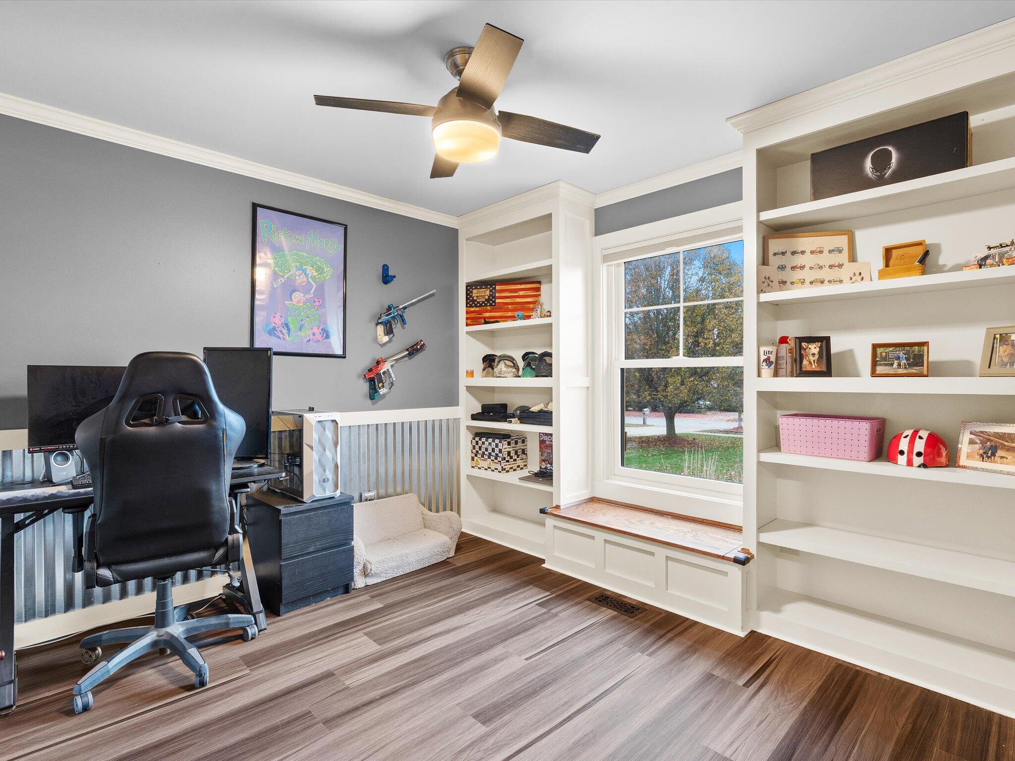8407 Heron Lake Road St. John, IN 46373 - Photo 14 of 22 a workspace with furniture hardwood and a window