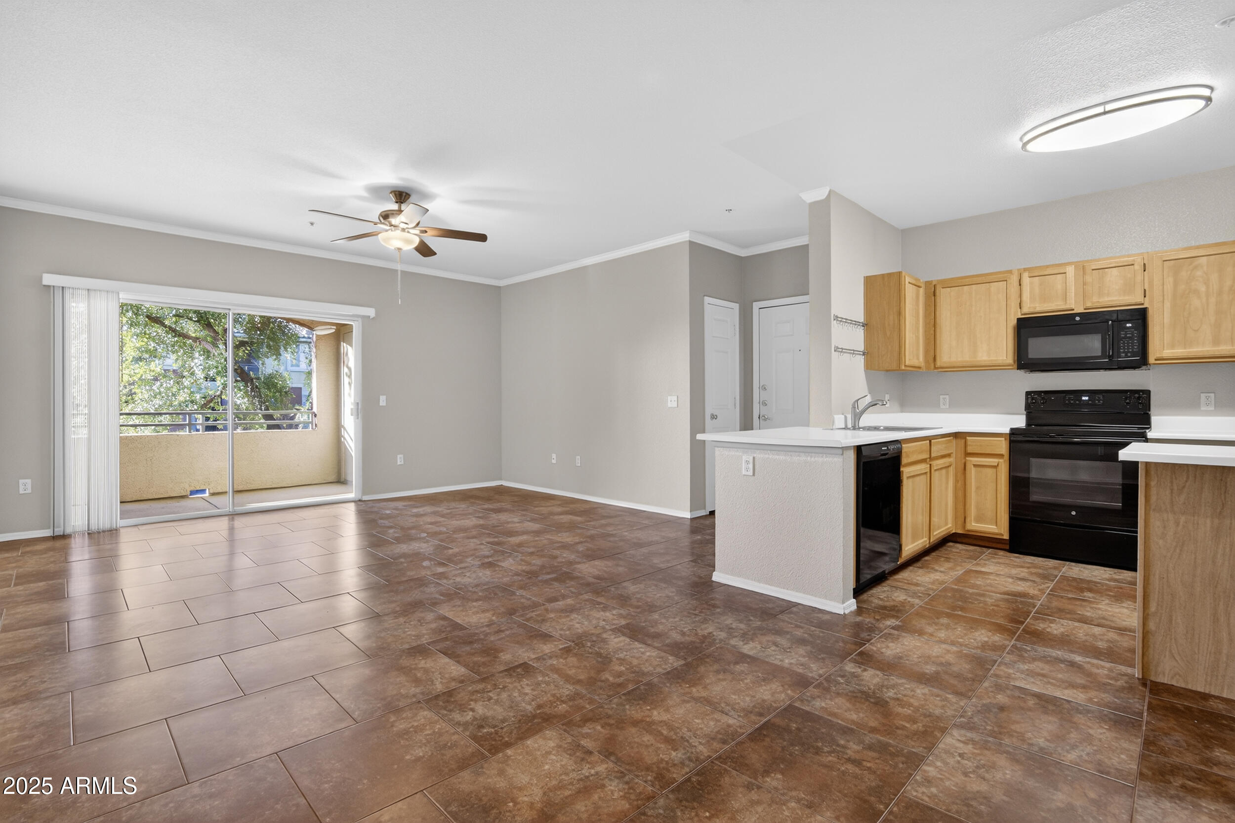 5401 East Van Buren Street, Unit 2076 Phoenix, AZ 85008 - Photo 14 of 41 a view of a kitchen with electric appliances and cabinets