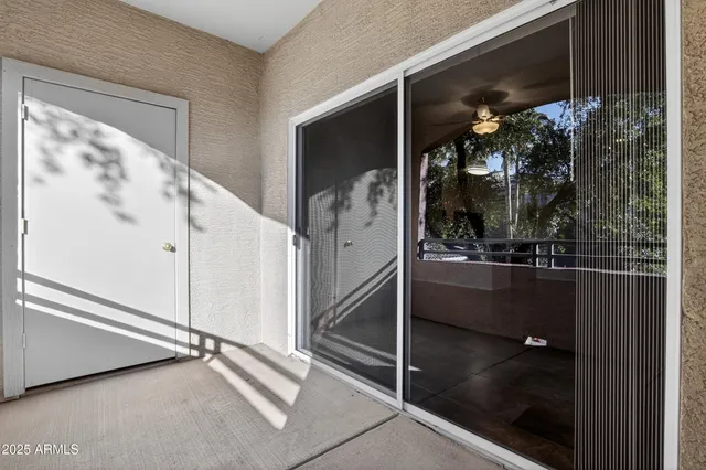 a view of a porch with seating space