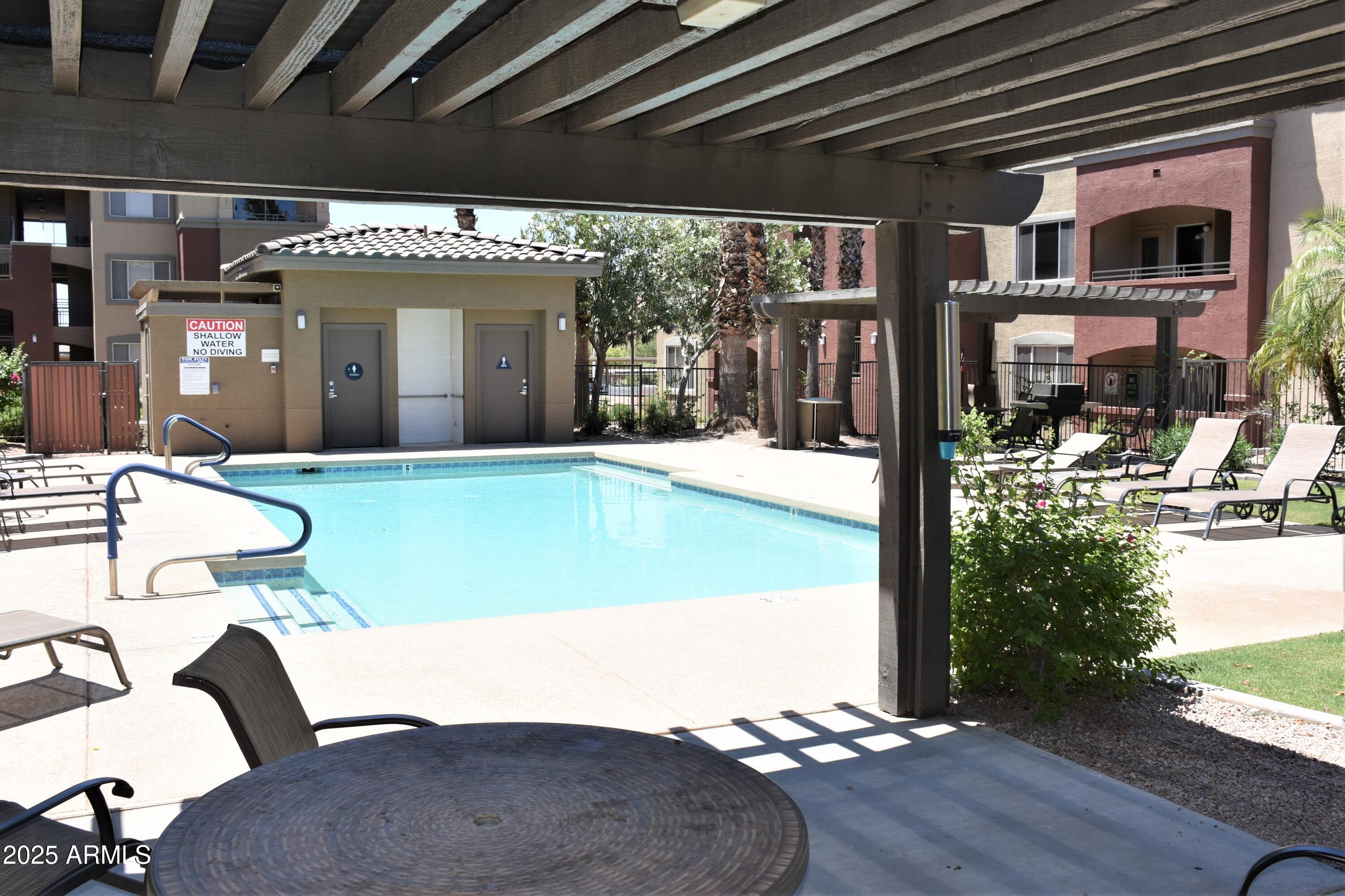 5401 East Van Buren Street, Unit 2076 Phoenix, AZ 85008 - Photo 30 of 41 a view of a porch with seating space