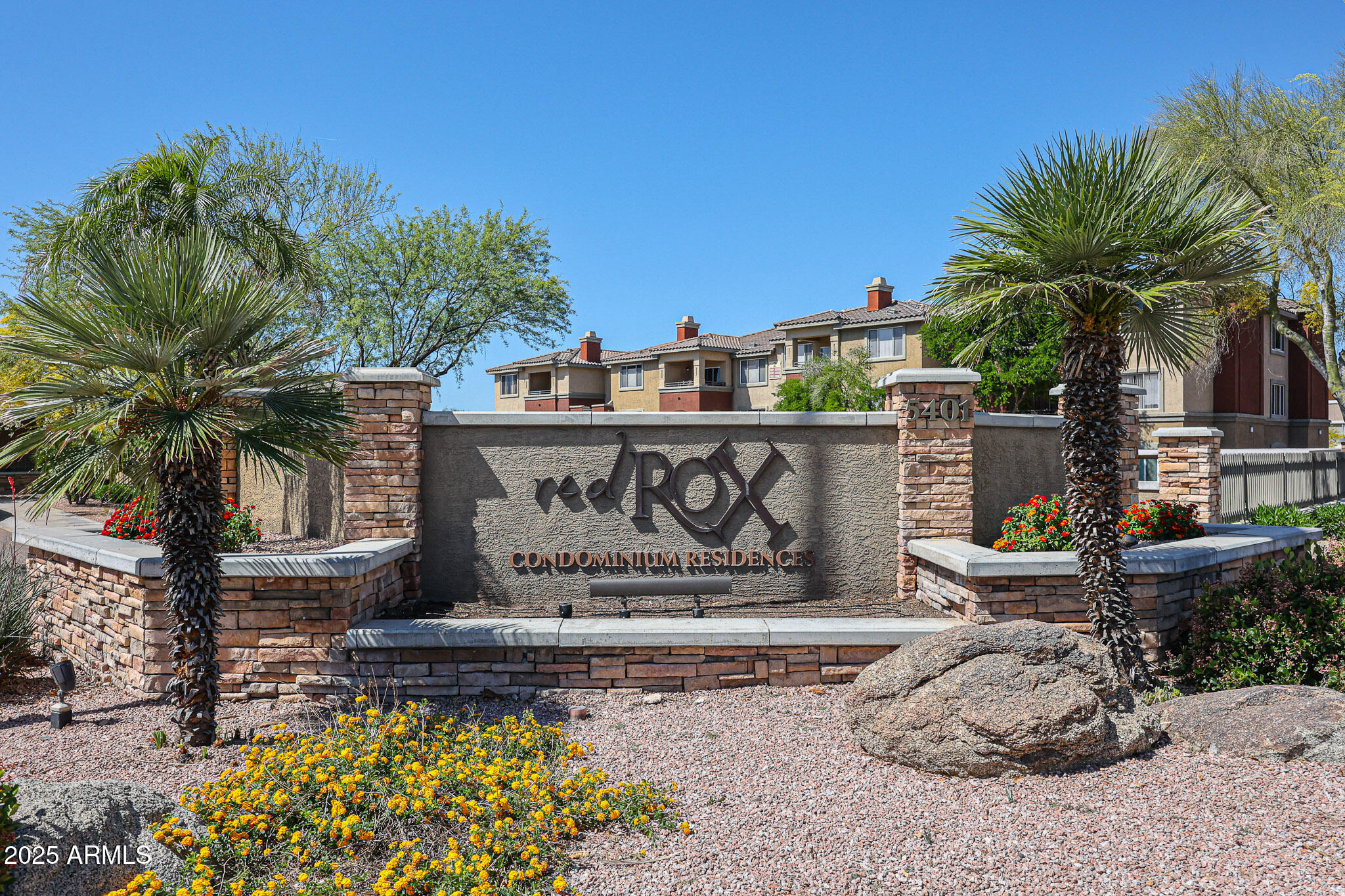 5401 East Van Buren Street, Unit 2076 Phoenix, AZ 85008 - Photo 3 of 41 a sign on the side of a building