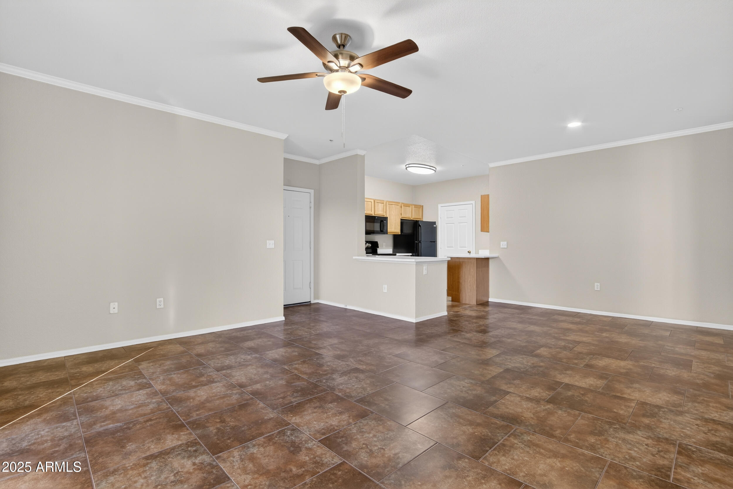 5401 East Van Buren Street, Unit 2076 Phoenix, AZ 85008 - Photo 5 of 41 a view of a kitchen with a sink and a refrigerator