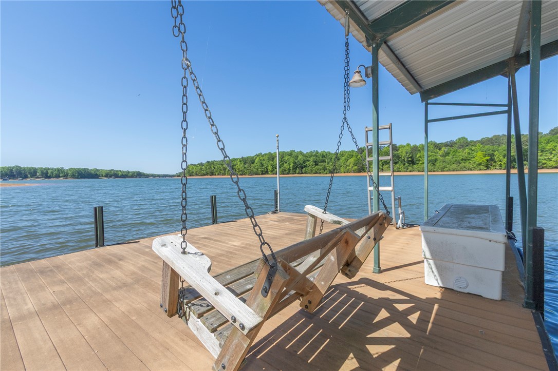 4420 Denver Cove Road Anderson, SC 29625 - Photo 45 of 50 This serene dock offers tranquil lake views, perfect for peaceful waterfront enjoyment.