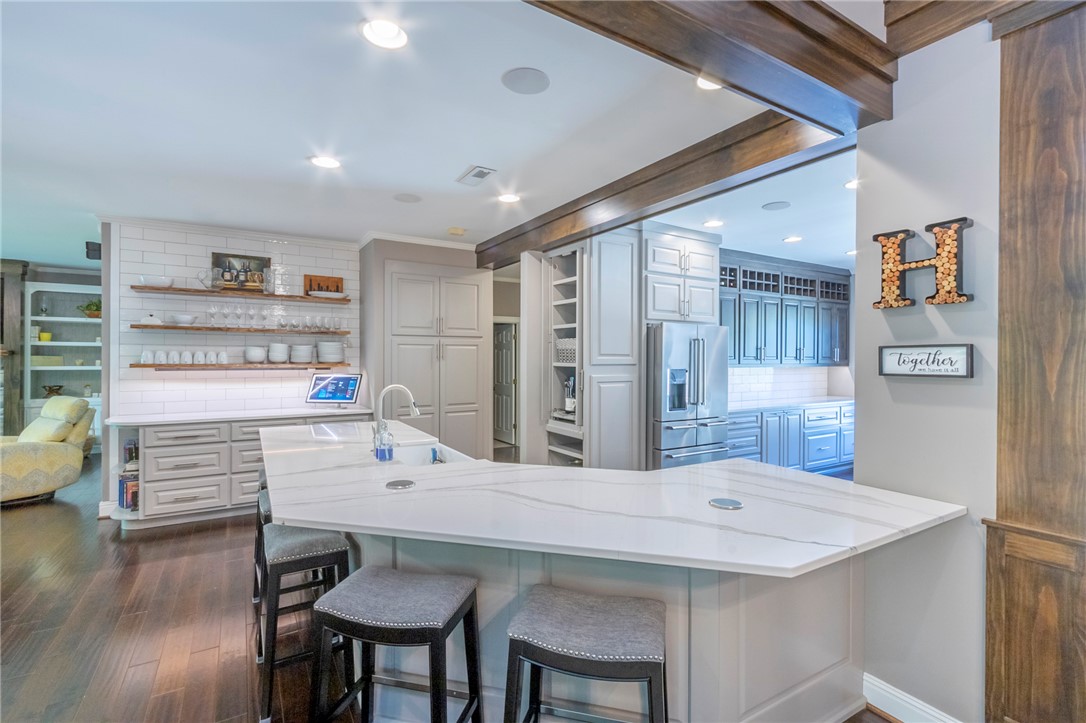 4420 Denver Cove Road Anderson, SC 29625 - Photo 7 of 50 This gourmet kitchen features sleek design, perfect for entertaining and everyday living.