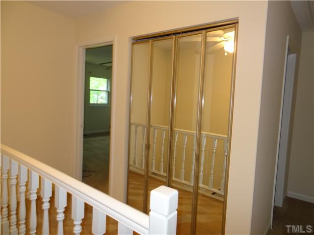 1200 Falls Church Road Raleigh, NC 27609 - Photo 8 of 16 a view of a bathroom from a glass door