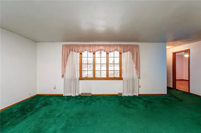 a view of a backyard of the house