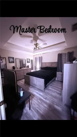 a black and white photo of a living room