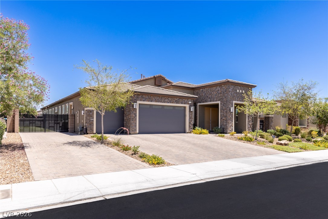 7036 Arabian Ridge Street Las Vegas, NV 89131 - Photo 10 of 64 Single Story Stunner with Elegant stone accents, 3 Car Garage, and RV Parking