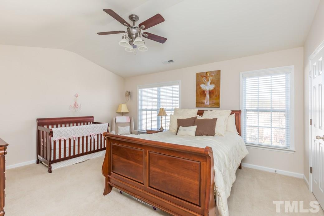 5443 Golden Arrow Lane Raleigh, NC 27613 - Photo 3 of 9 One of the two large master suites. Once has a large walk-in closet and the other has two large closets. Plenty of space and neutral decor - this home is move in ready!!