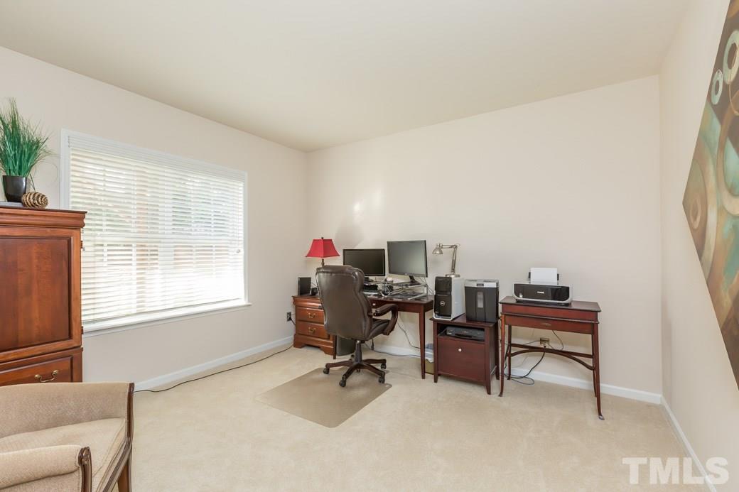 5443 Golden Arrow Lane Raleigh, NC 27613 - Photo 5 of 9 There are so many options for this main level - use it as a home office, play room, bonus, media - you choose. There is also a half-bath.