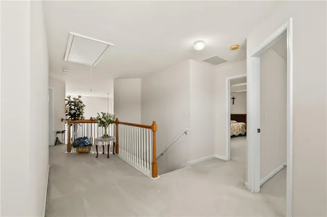 a bed room with a bed and a large window