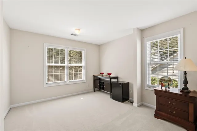 a room with furniture and a book shelf