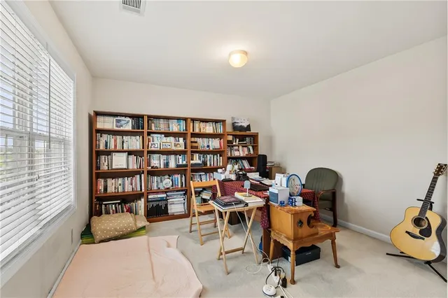 a view of backyard with green space