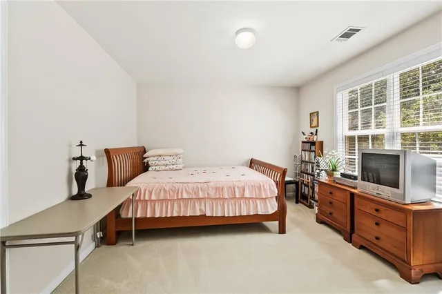 an aerial view of house with yard swimming pool and outdoor seating