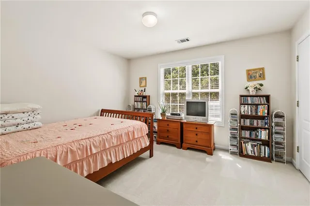 an aerial view of residential house with outdoor space and swimming pool
