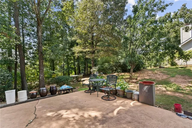 an aerial view of a house with a garden