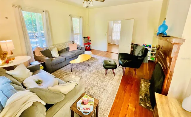 a view of a living room and dining room