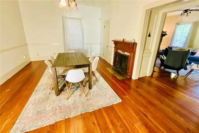 a bed room with a bed and dresser