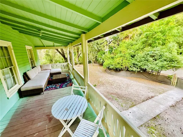 a bathroom with a sink mirror and vanity