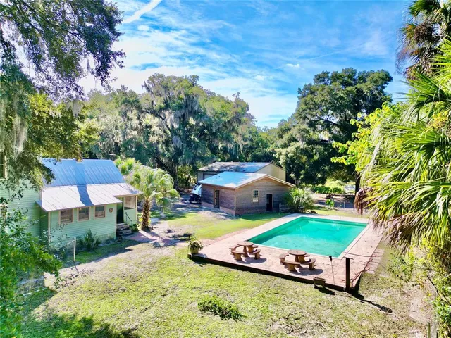 a table with a vase and flowers