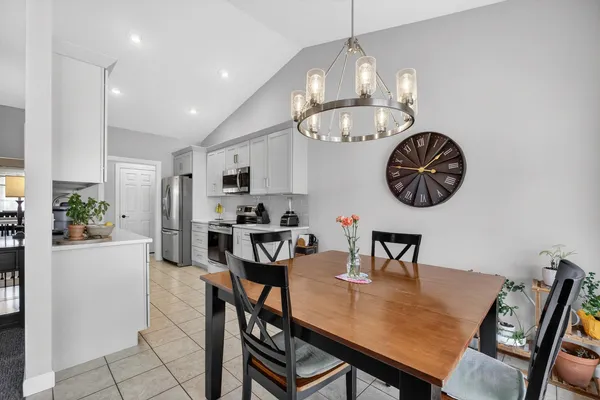 a spacious bathroom with a double vanity sink and a mirror