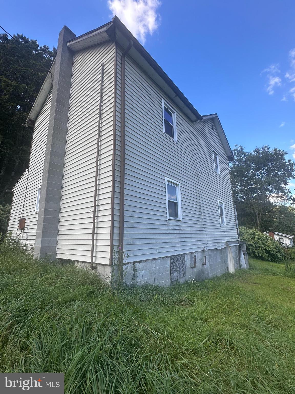 20628 Water Station Run Road Lonaconing, MD 21539 - Photo 2 of 11 a view of a house with a yard