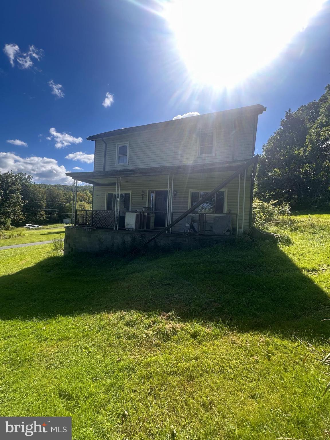 20628 Water Station Run Road Lonaconing, MD 21539 - Photo 7 of 11 a view of a house with a yard
