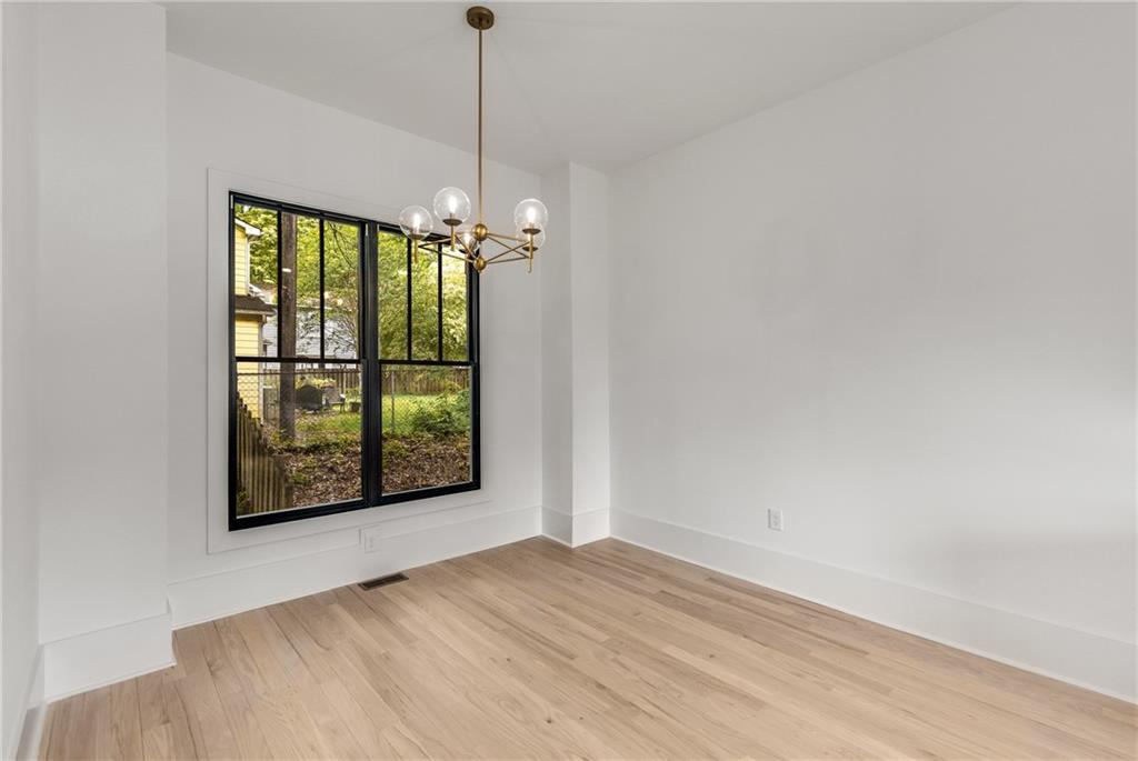 628 Robinson Avenue Southeast, Unit B Atlanta, GA 30312 - Photo 18 of 77 a view of an empty room with a window