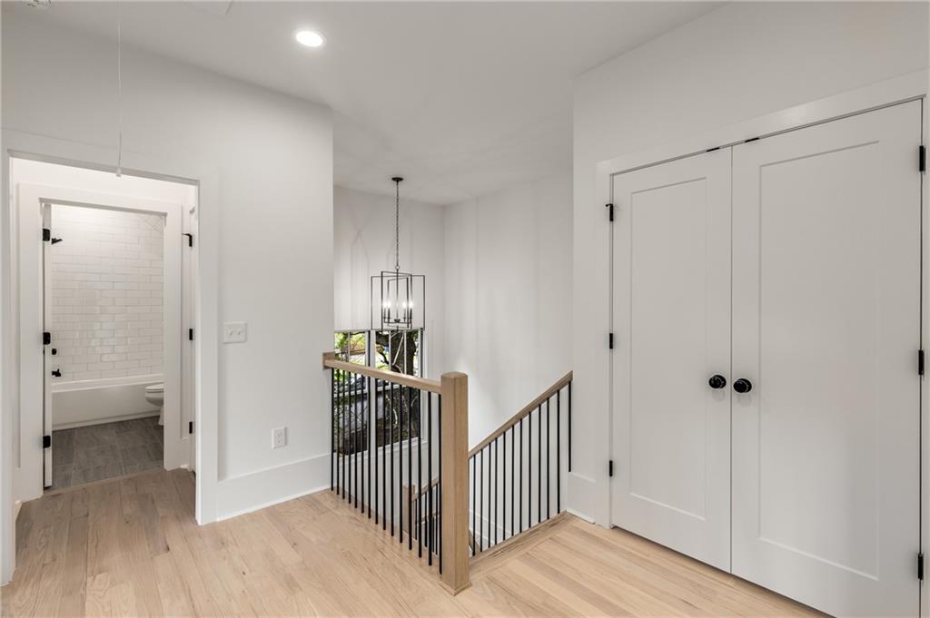 628 Robinson Avenue Southeast, Unit B Atlanta, GA 30312 - Photo 27 of 77 a view of a hallway with wooden floor and closet area