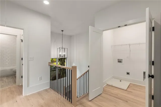 a bathroom with a shower and a sink