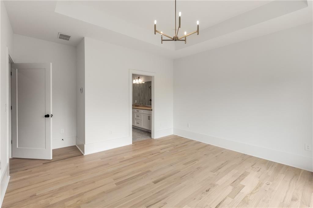 628 Robinson Avenue Southeast, Unit B Atlanta, GA 30312 - Photo 31 of 77 a view of empty room with wooden floor