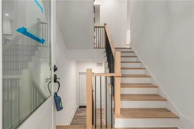 a swimming pool with outdoor seating and yard