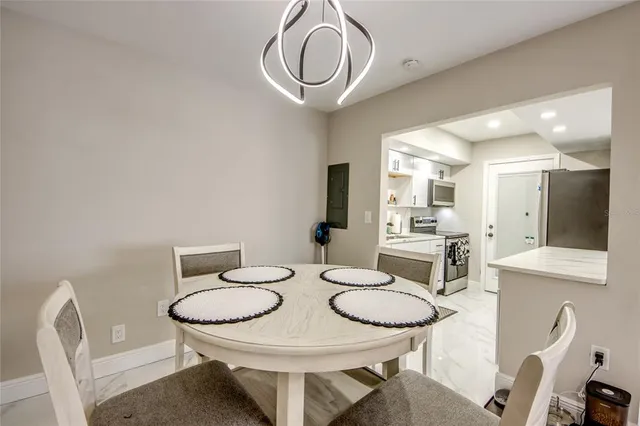 a view of a dining room with furniture