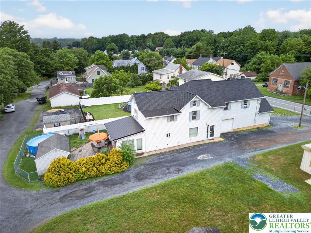 2628 Levans Road Coplay, PA 18037 - Photo 4 of 54 An aerial perspective reveals a generously sized lot with ample outdoor space and mature landscaping.