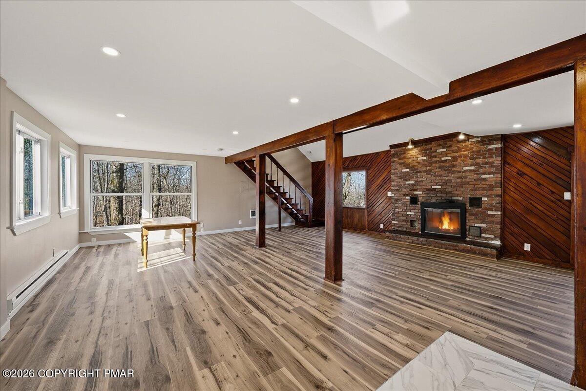211 Geese Court Bushkill, PA 18324 - Photo 4 of 35 Living Room/ Dining Area