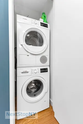 a utility room with dryer and washer