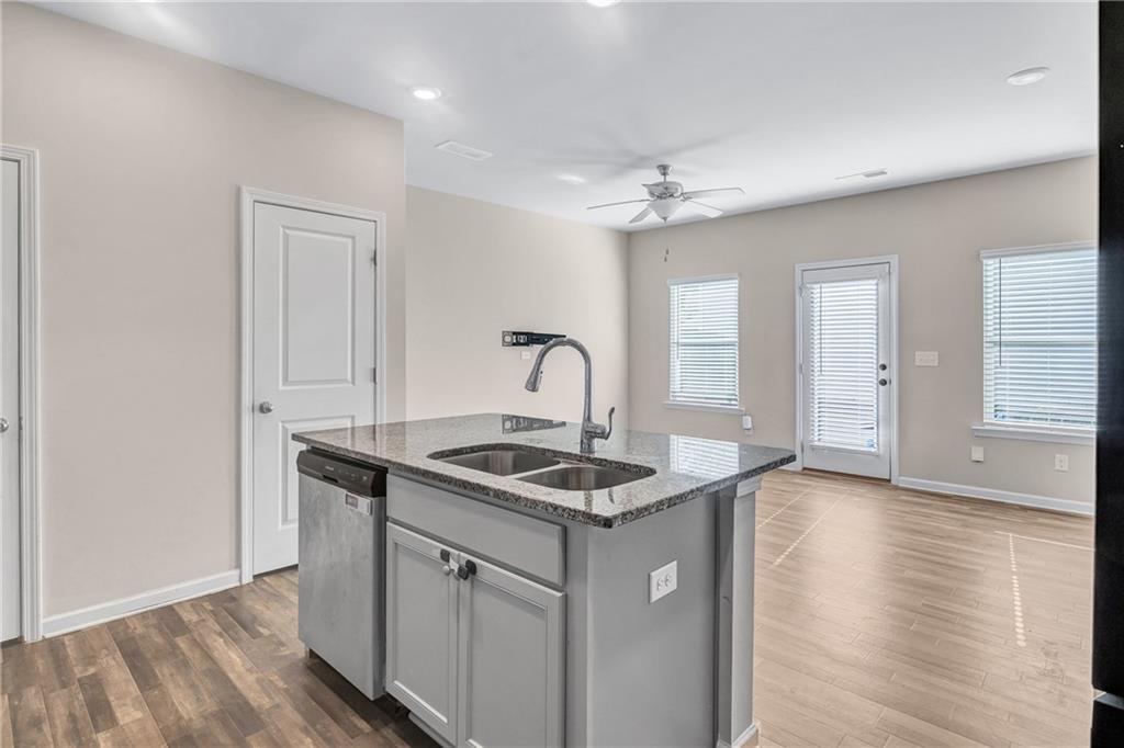 585 McWilliams Road Southeast, Unit 903 Atlanta, GA 30315 - Photo 11 of 37 a kitchen with sink and window