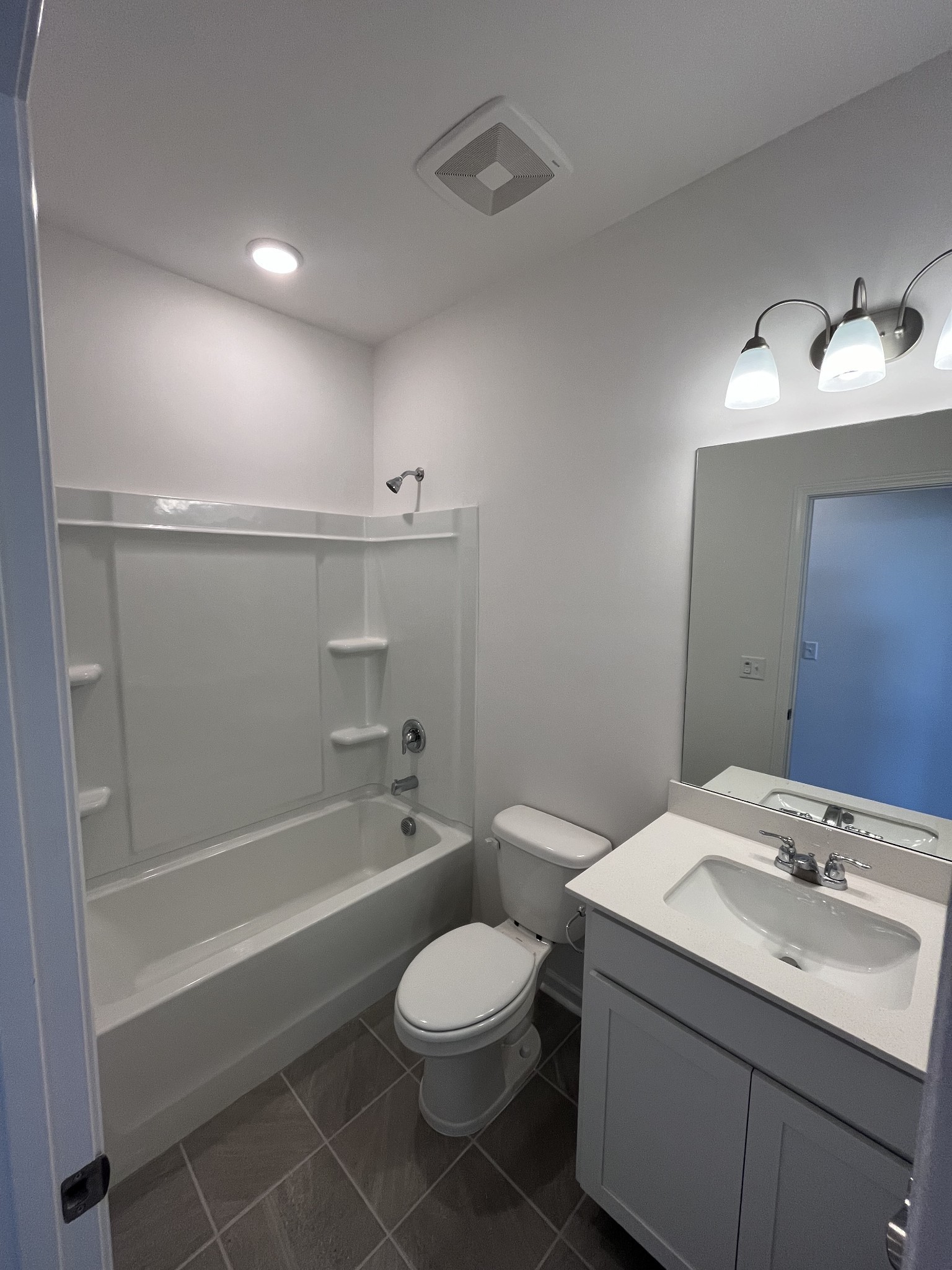 3547 Peace Road Columbia, TN 38401 - Photo 11 of 35 ***This photo is from a previously built Rosemont home to see the layout*** Bath #2 includes tile flooring and quartz countertops.