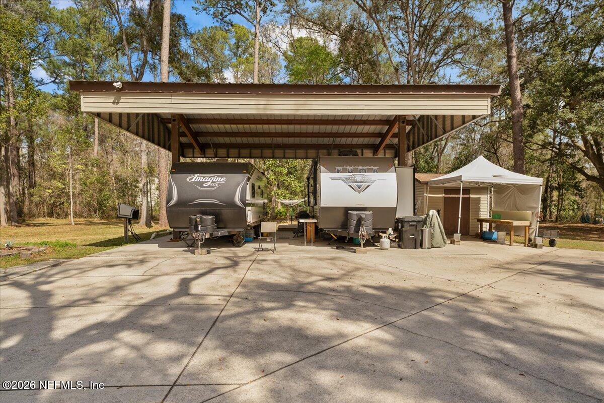 4229 Lazy Acres Road Middleburg, FL 32068 - Photo 18 of 41 a view of a car garage